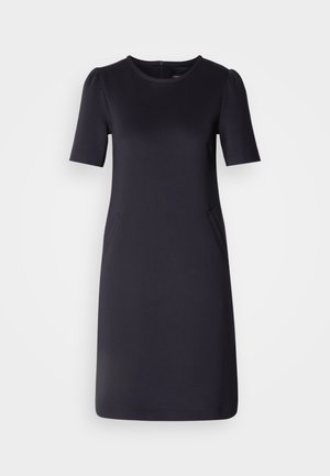 Navy blue dress with short sleeves, round neckline, and two side pockets. Soft, smooth fabric with a relaxed fit and knee-length design.