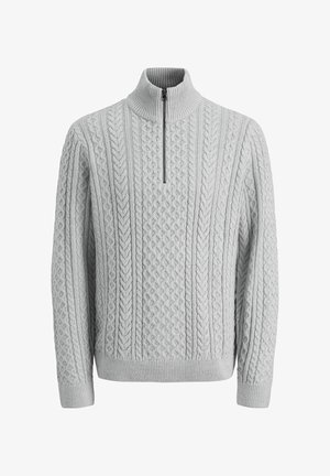 Hele halli kudumüts kõrge kaelusega ja poole tõmblukuga. Omab tekstuuri cable mustreid ning soonikkoes mansette ja allserva.