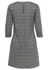 Karierte Kleid in Schwarz, Grau und Beige mit Dreiviertelärmeln, geradem Schnitt und einem Reißverschluss auf der Rückseite. Strukturierter Stoff mit Mustern.