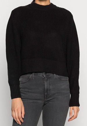 Stickad tröja - black