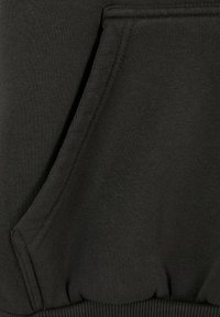 Black sweatshirt fabric with a kangaroo pocket, ribbed cuffs, and waist. The texture is smooth, with stitching details visible along the seams.