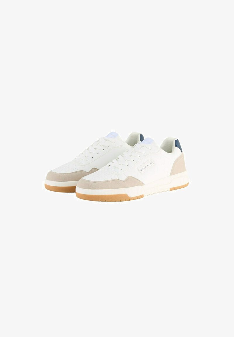White sneakers with a textured mesh upper, beige suede accents, and a cushioned sole. Features lace-up closure and a blue logo detail.