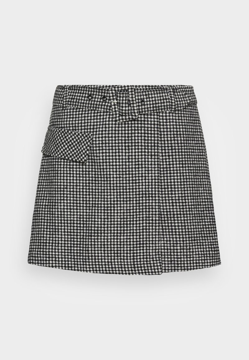 Mini-jupe à carreaux noir et blanc avec une taille haute, des passants pour ceinture et une petite poche à rabat sur le côté gauche.