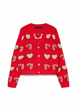Czerwony sweter z dzianiny z białymi wzorami w cukrowe laski i serca, z dekoltem w serek, ściągaczami przy mankietach i zapięciem na guziki.