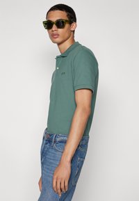 GAP LOGO - Pólóing - forest green