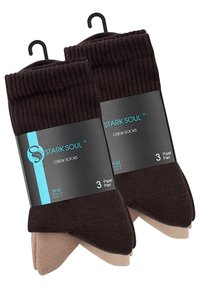 Tre paia di calze a nave in marrone scuro e beige. Realizzate in materiale morbido con polsini a coste, confezionate con un'etichetta nera con dettagli blu.