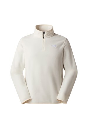 Crèmekleurige fleece trui met een hoge kraag en een kwart ritssluiting. Voorzien van een klein logo op de borst en lange mouwen. Zachte textuur.