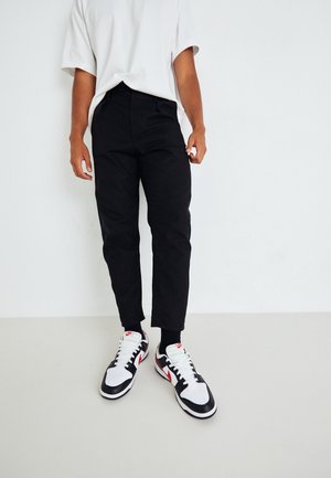 Pantalones chinos - black