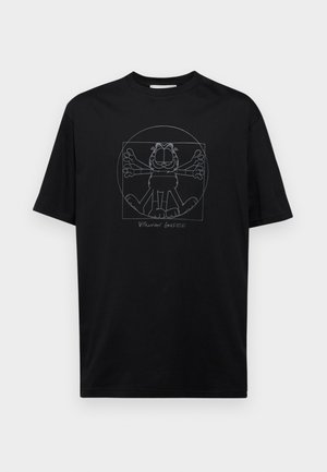 T-shirt en coton noir avec un graphique en contour blanc d'un chat cartoon avec les bras écartés, centré dans un design circulaire.
