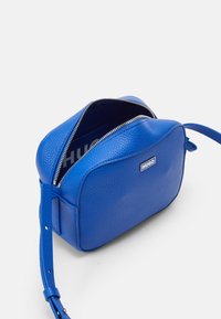 HUGO ZESY CROSSBODY UNISEX - Cross body bag - open blue