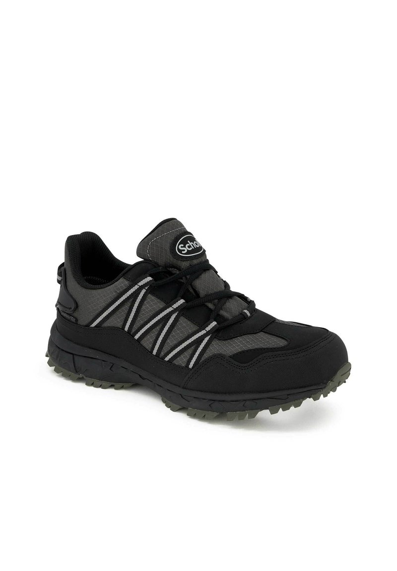 Scarpa atletica nera e grigia con tomaia in mesh, suola in gomma e motivo di allacciatura testurizzato. Presenta un collo imbottito e battistrada durevole.
