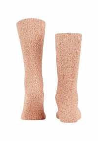 Strumpfhosen in einem Pfirsichton mit roten und orangenen Sprenkeln. Gerippter Bund und glatte Oberfläche. Mittlere Wadenlänge.