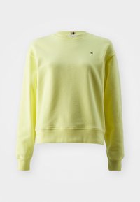 Geel sweatshirt met een ronde hals, lange mouwen en ribgebreide manchetten en onderrand. Bevat een klein logo op de borst. Zachte stofstructuur.