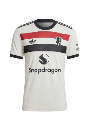 Jersey de fútbol blanca de manga corta con franjas horizontales negras, rojas y azul marino, que presenta un emblema y el logo "Snapdragon" en la parte frontal.
