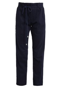 Mörkblå byxor med elastisk midjeresår och justerbar dragsnör. Har två sidofickor och en lös, rak bendesign.