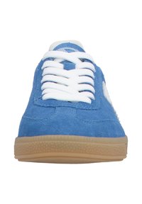 Blue suede sneaker with white laces, textured surface, and a gum rubber sole. Features a simple design with minimal detailing.