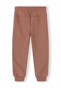 Pantalon de jogging à taille élastique marron avec poignets côtelés, présenté à plat avec le dos visible, sur un fond blanc.