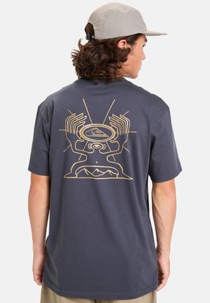 Navy blue cotton t-shirt featuring a gold graphic of hands and a mountain design on the back, short sleeves, and a straight hem.