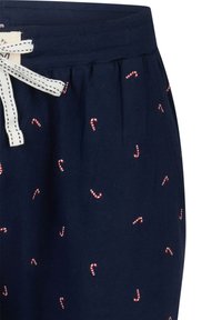 Marineblauwe pyjamabroek met een all-over patroon van rode en witte candy canes, voorzien van een zachte tailleband en een wit trekkoord met zwarte stiksels.