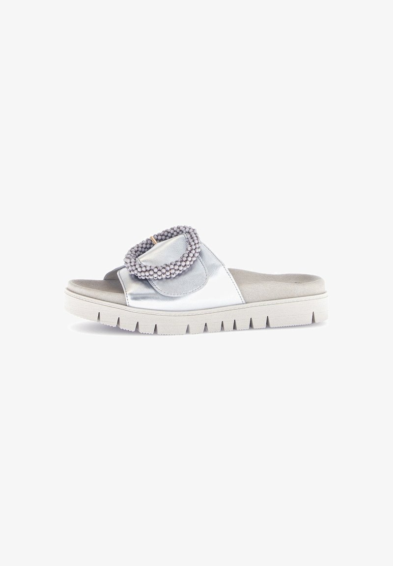 Metallic silver slide sandal with a textured strap featuring bead accents, gray cushioned insole, and a white segmented outsole.