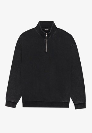 Fekete pulóver puha anyagból, cipzáras állógallérral, hosszú ujjal, bordás mandzsettákkal és aljjal.