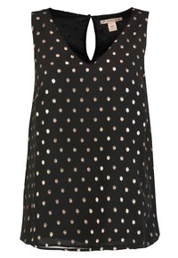 Haut noir sans manches avec col en V et détail œillet, orné d'un motif à pois dorés sur un tissu lisse. Coupe régulière, design léger.