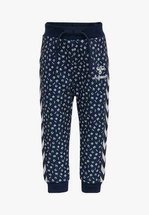 Mörkblå joggingbyxor med ett vitt abstrakt bokmönster, resårmidja med dragsko och kontrasterande sidoremsor.