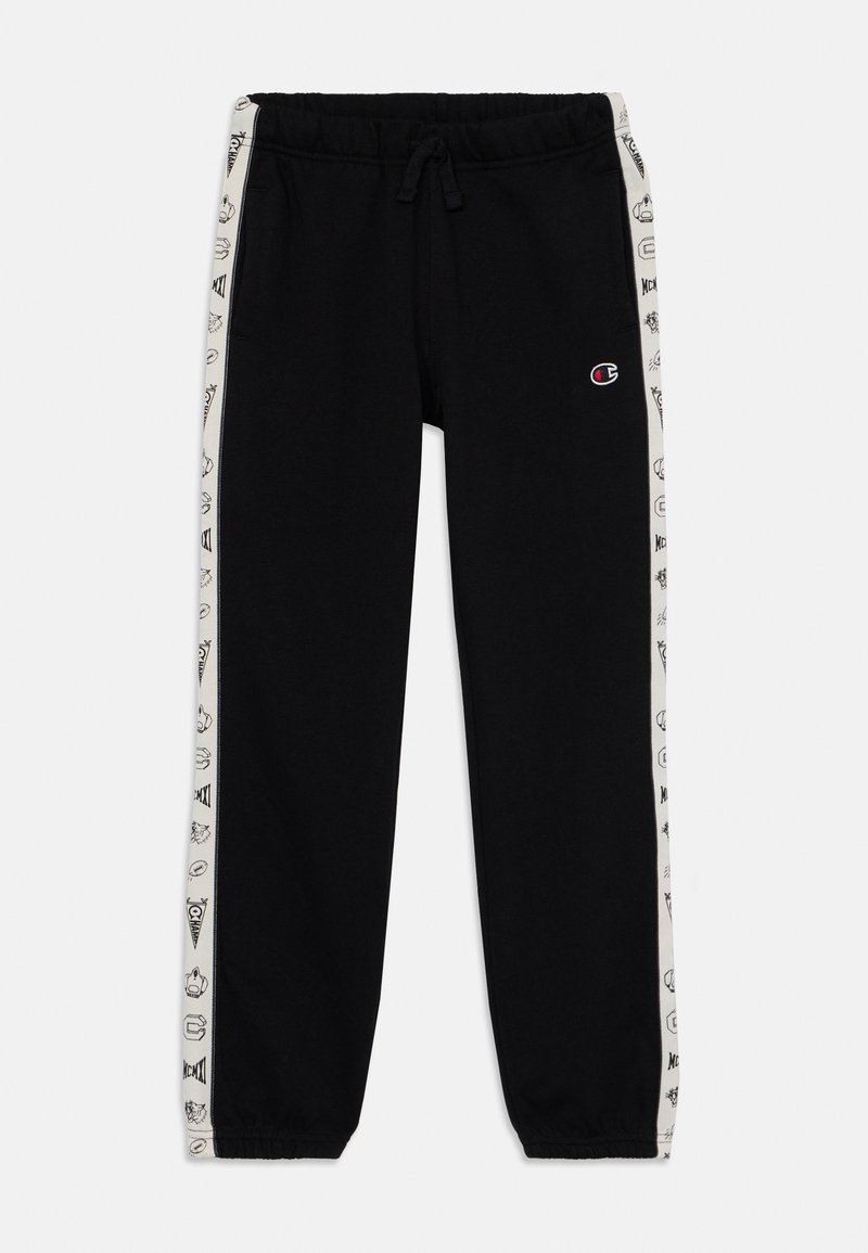 Black jogger pants with elastic waistband, featuring white side stripes adorned with various black graphics. Soft fabric with a relaxed fit.