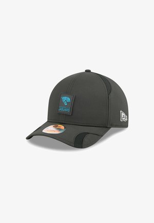 Black cap with a rounded crown and curved brim. Features a blue Jacksonville Jaguars logo patch and mesh side panels for breathability.