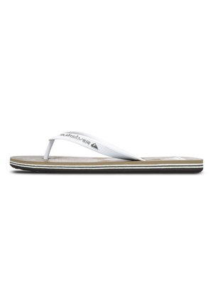 Bruine flip-flops met een gestructureerde voetbed en witte rubberen banden. Heeft witte accentstrepen langs de zool. Quiksilver-logo op de band.