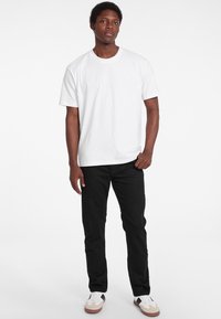 Guess Jeans SLIM  - Slimfit džínsy - schwarz