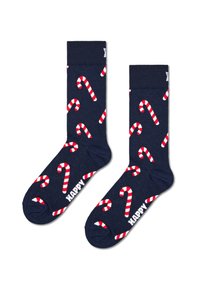 Granatowe skarpetki wykonane z mieszanki bawełny, z wzorem w czerwono-białe paski przypominające laseczki cukrowe. Napis "HAPPY" nadrukowany z boku, w pobliżu palców.
