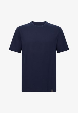 Mornarškoplava bombažna majica s kratkimi rokavi in okroglo izrezko, z majhnim logotipom na spodnji strani. Gladka tekstura, klasičen kroj.