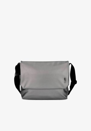 Graue Umhängetasche mit schwarzem verstellbarem Schultergurt, Klappverschluss und kleinem "lamz"-Logo in der unteren rechten Ecke.