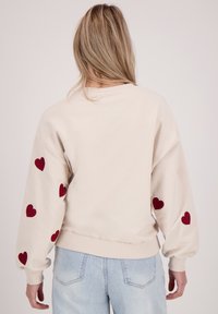 JE M'APPELLE Sweater - beige