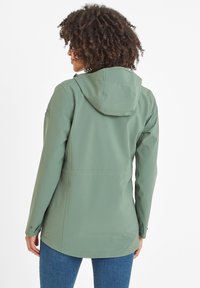 Green waterproof jacket with a hood, adjustable cuffs, and a cinched waist. Smooth texture and simple design, ideal for outdoor use.