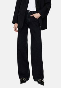 ANINE BING PANAMA - Jeans a zampa - nero