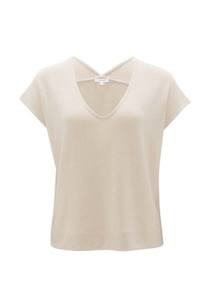 Top beige à manches courtes avec un décolleté en V profond et un design croisé au dos. Fabriqué à partir d'un tissu doux et texturé avec une coupe décontractée.