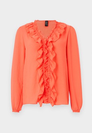 Κοραλλί μπλούζα με μακριά μανίκια, ντεκολτέ V με βολάν και λεπτομέρειες στο μπροστινό μέρος, ελαστικά μανσέτες και ελαφρώς άνετη εφαρμογή.