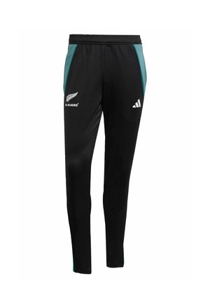 Pantalons de sport noirs avec des panneaux latéraux turquoise, taille élastique et détails de logo. Fabriqués à partir d'un tissu extensible et texturé pour le confort.