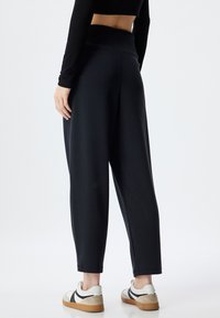 Koton MODAL - Pantalones - black