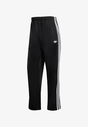 Μαύρο αθλητικό παντελόνι από πολυεστέρα, με τρεις λευκές κάθετες ρίγες κατά μήκος των πλευρών και κεντημένο λογότυπο στον γοφό.