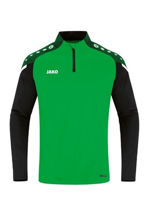 Groen en zwart sporttop met lange mouwen en een kwartrits, wit "JAKO"-logo op de borst, groene schouderpanelen met witte stippen.