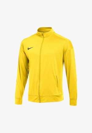 Gelbe Sportjacke mit durchgehendem Reißverschluss, langen Ärmeln und Seitentaschen, mit einem schwarzen Nike-Swoosh-Logo auf der linken Brust.