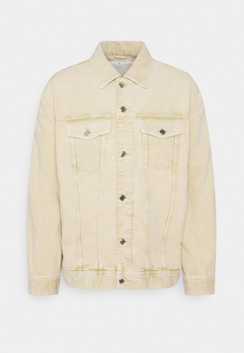 Veste en velours côtelé beige clair avec fermeture à boutons, deux poches poitrine à rabats boutonnés et un col classique.