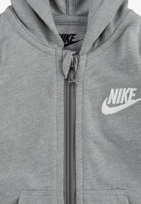 Nike Sportswear BABY COVERALL UNISEX - Jumpsuit - grey heather