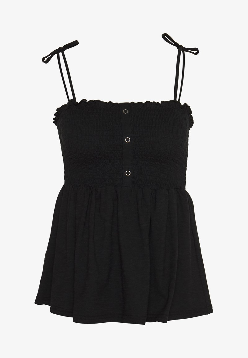 Haut sans manches noir à smocks avec de fines bretelles réglables et trois petits œillets ronds en métal au centre devant.