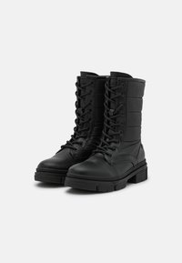 XTI Botines con cordones - black