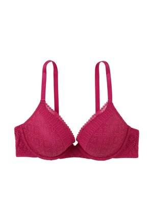 Reggiseno in pizzo fucsia con coppe triangolari, spalline regolabili e bordo scallop. Presenta motivi floreali e una superficie testurizzata.