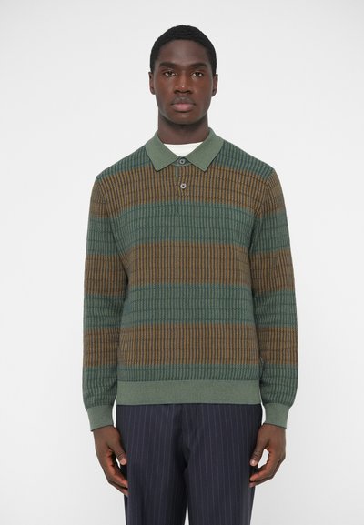 Knit polo shirt in green with horizontal stripes in brown and teal. Features a ribbed texture, collar, and three-button placket.